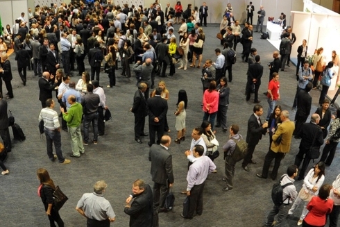 A large group of people in a room - Inter American Development Bank – IDB Financial Markets
