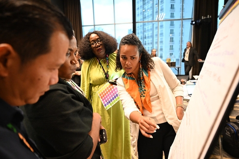 Persons participating in a workshop - Capacity Building - Inter American Development Bank - IDB